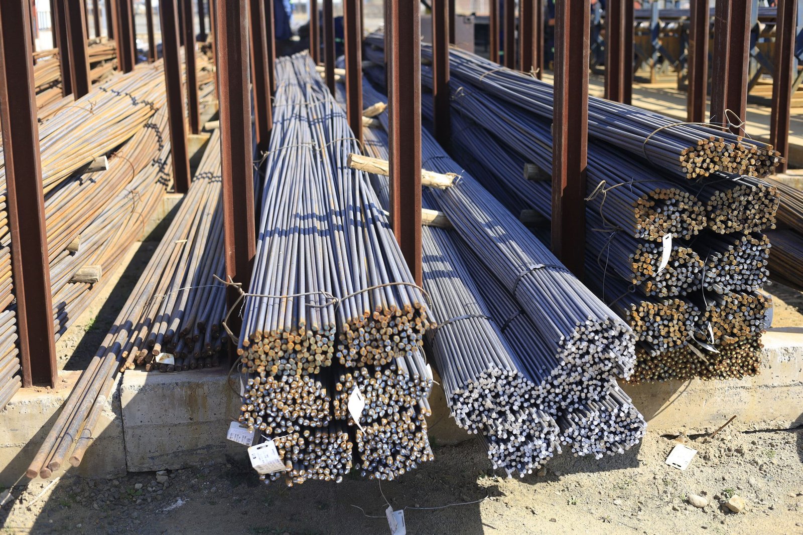 Steel and reinforcing material stock